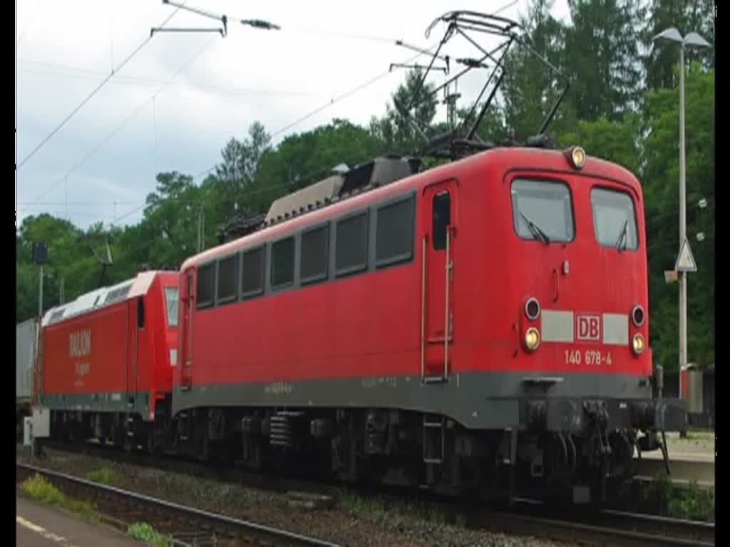140 678-4 mit einer 185 in Doppeltraktion bei der Einfahrt und Signalhalt in Eichenberg in Fahrtrichtung Norden. Aufgenommen am 30.06.2010.