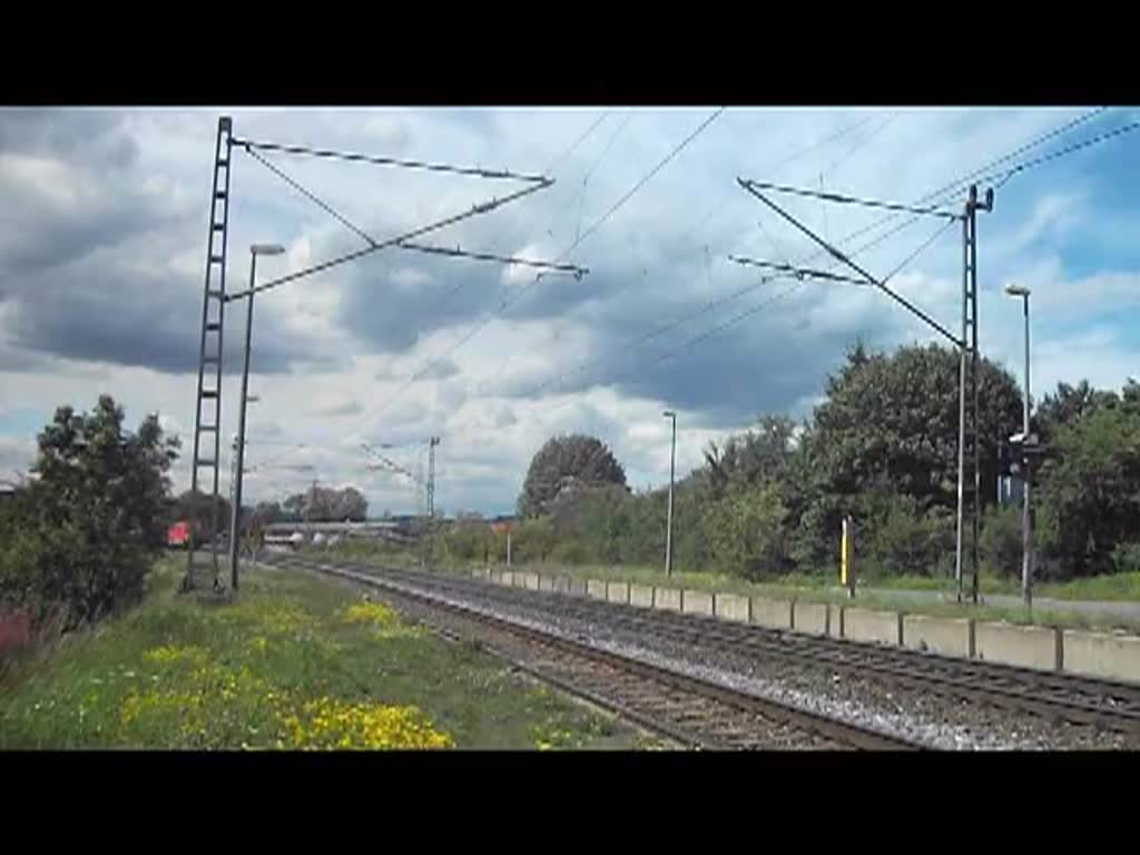 185 357 durchfhrt am 15.Juli 2011 mit einem gemischten Gterzug den Bahnhof Gundelsdorf Richtung Kronach.