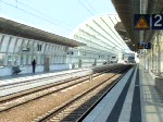 BR 101 mit Zugen Eine 101 durchf�hrt mit einem EC Ludwigshafen Mitte. Kurz darauf f�hrt ein ET 425 in den S-Bahnhof ein.