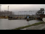 BR 202 Sonderzug 5820 / 5821 war eingelegt zur Fahrt Putbus - Szczecin / Stettin - Putbus. Aufgenommen bei schlechtem Wetter in langsamer Fahrt �ber die Anklamer Eisenbahnbr�cke und in voller Fahrt ( V/max 80 km/h ) durch den Bahnhof Jatznick. - 22.01.2012
