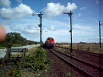 BR 218 mit Zugen Der SyltShuttle erh�lt gerade die ausfahrt am Bahnhof Keitum auf Sylt 
Der DB Shuttle ist gerade auf dem weg nach Westerland.

Sylt im Sommer 2009

