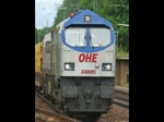 OHE Tiger 330091 mit voll beladenem Holzzug f�hrt in Richtung ...