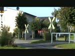 BR 99 An einem Bahn�bergang der 'R�genschen B�derbahn' in Baabe habe ich die 99 4011 im September 2011 gefilmt.