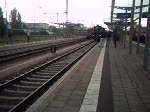 03 1010 mit Sonderzug von Berlin-Schneweide nach Warnemnde bei der Ausfahrt im Rostocker Hbf.(09.08.08)