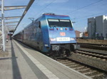 101 070-1 mit IC2373 von Stralsund nach Karlsruhe Hbf bei der Ausfahrt im Rostocker Hbf.30.03.10