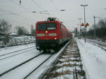 112 183-9(BW Cottbus)mit S1 von Rostock Hbf.nach Warnemnde  bei der Ausfahrt im Bahnhof Rostock-Bramow(18.01.10)
