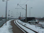 Ein RE nach Hannover Hbf verlsst am 06.02.2010 Norddeich Mole in Richtung Norden, geschoben von einer 146.1.