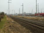 RE 13115 Wismar-Tessin bei der Ausfahrt im Rostocker Hbf.recht´s steht schon der neue Star fr Rostock bereit.01.03.2012