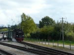Dampflok 99 4011-5 der Rgensche Bderbahn - Rasender Roland, fhrt mit ihrem Zug aus dem Bahnhof von Binz in Richtung Putbus.
