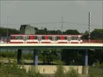 Fahrt der Linie 903 der DVG am 3. September 2011 auf der Brcke der Wanheimer Strae am RheinPark.