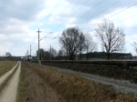 ITL 185 548-5 mit Containerzug zwischen Growudicke und Rathenow in Richtung Stendal unterwegs.