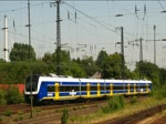 Die am 5. Juli 2011 aus Wanne-Eickel Hbf. in Richtung Dortmund ausfahrende RB 43 der NordWestBahn (VT 726) begegnet dem aus Richtung Mnster kommenden 440 218 auf seiner Fahrt nach ?.