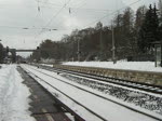 185 531-1 mit Aufliegerzug in Fahrtrichtung Norden. Aufgenommen am 13.02.2010 in Eichenberg.