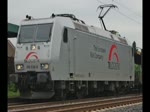185 538-6 mit einem leeren Autotransportzug in Fahrtrichtung Sden durch Ludwigsau-Friedlos. Aufgenommen am 23.07.2010.