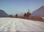 1116 204-7 zieht ein RJ bei Niederaudorf. 18.02.10  ...