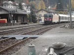 re-4-4-ii-re-420 Re 4/4 II f�hrt mit einem IR aus Faido aus.