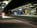 Re 10/10 mit KLV-Zug bei Prattel am  11.03.2009