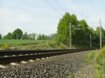 19.5.2012 8:42 ČD 362 057-2 mit einem Schnellzug aus Cheb nach Praha hl.n. in der N�he der Talsperre Jesenice zwischen den Haltestellen Cheb V�eboř und Stebnice. 