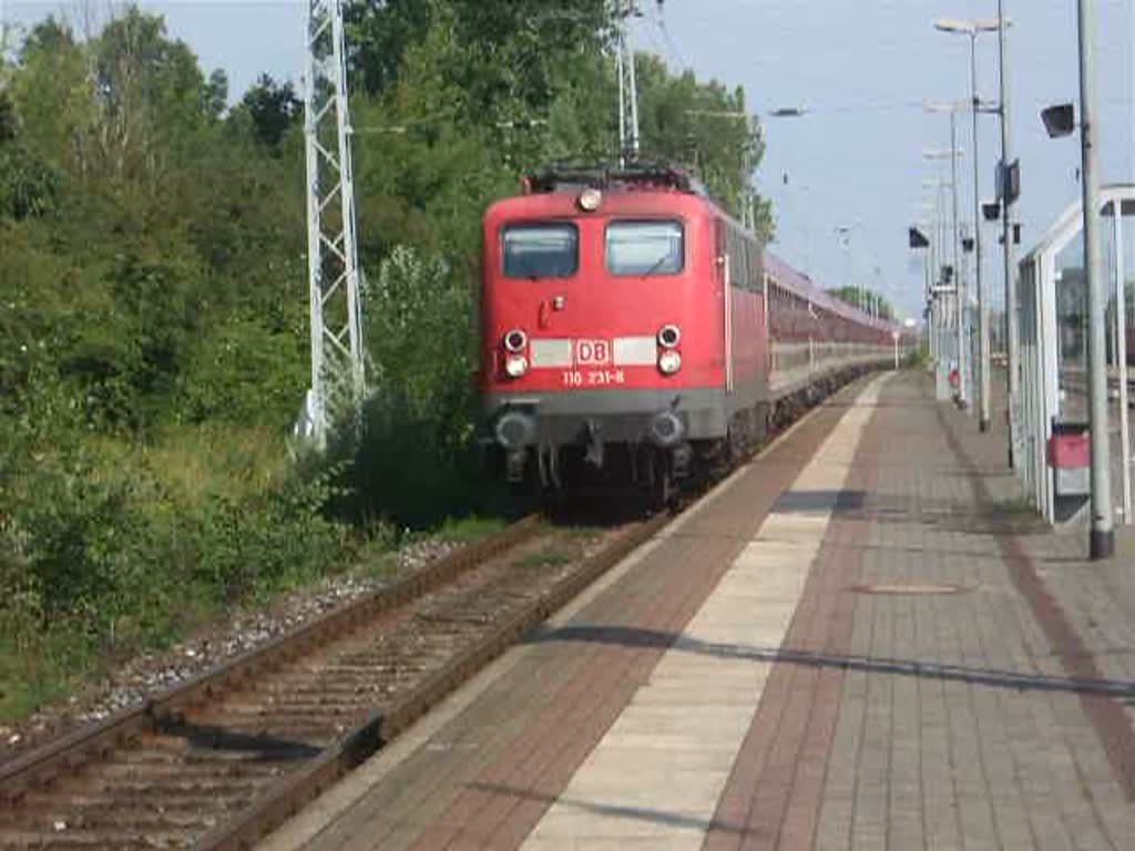 110 231-8 mit DZ2781 von Warnemnde nach Berlin-Ostbahnhof bei der Durchfahrt im Bahnhof Rostock-Bramow.(02.08.09)