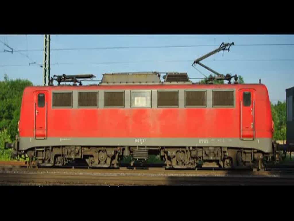 140 774-1 mit Containerzug in Fahrtrichtung Norden am 14.06.2010 durch Eschwege West.