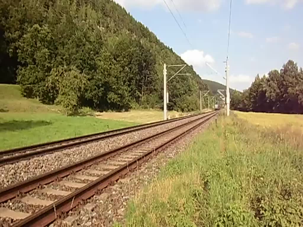 143 041-2 der RBH fhrt am 12.07.13 mit einem Leerholzzug durch Remschtz.