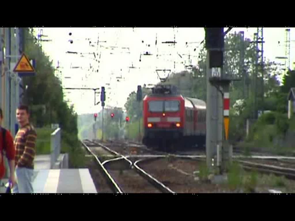 143 849-8 fährt mit einem RE von Cottbus nach Dresden Hbf in den Bahnhof Priestewitz auf Gleis 1 ein. (22.05.2010)