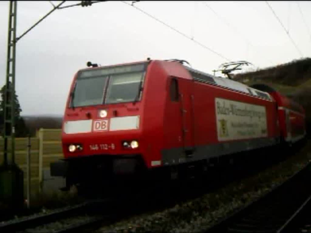 146 112-8 beschleunigt ihren RE Offenburg - Basel Bad Bf aus Istein. Nchster Halt: Efringen-Kirchen. 05.02.2008