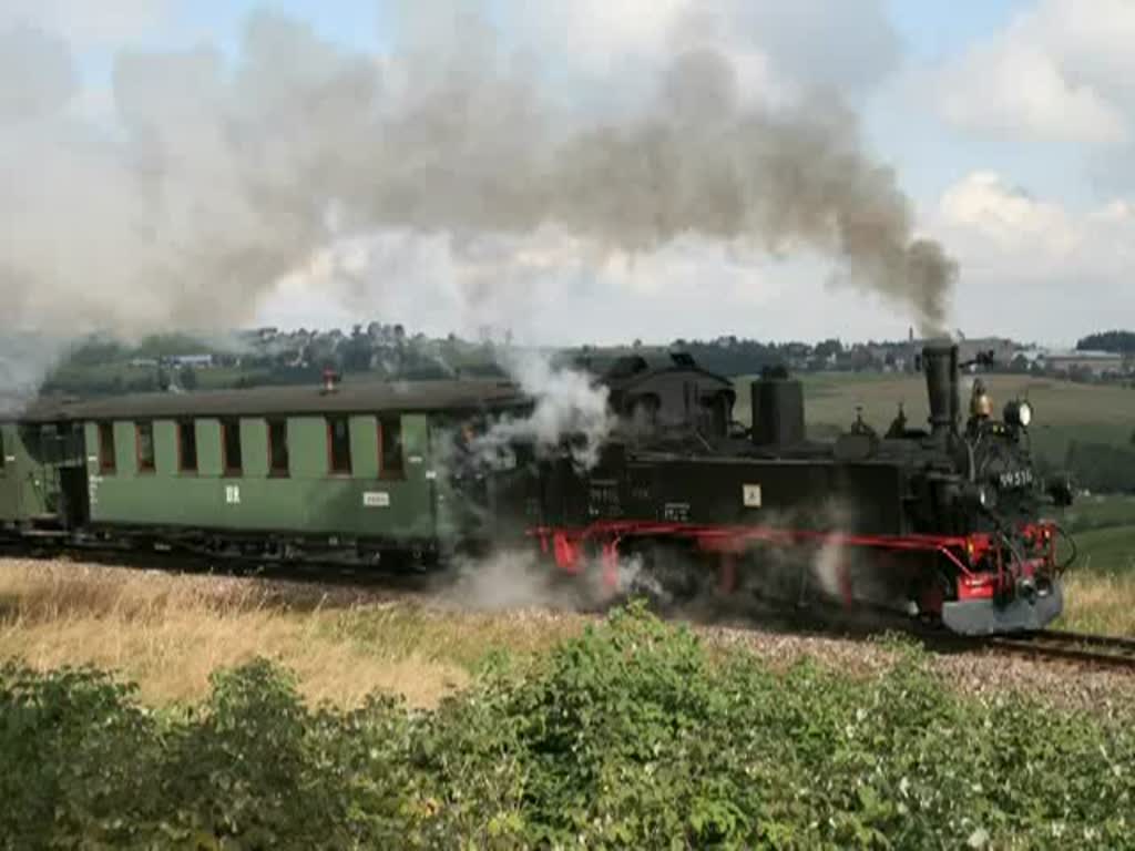 99 516 der Museumbahn Schnheide ist am 12. September 2009 mit einen Personenzug unterwegs.