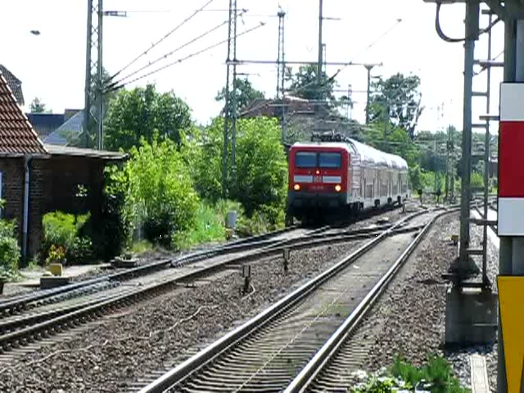 BR 114 028 mit RE .... fährt im Bahnhof Ludwigslust ein 01.08.2009