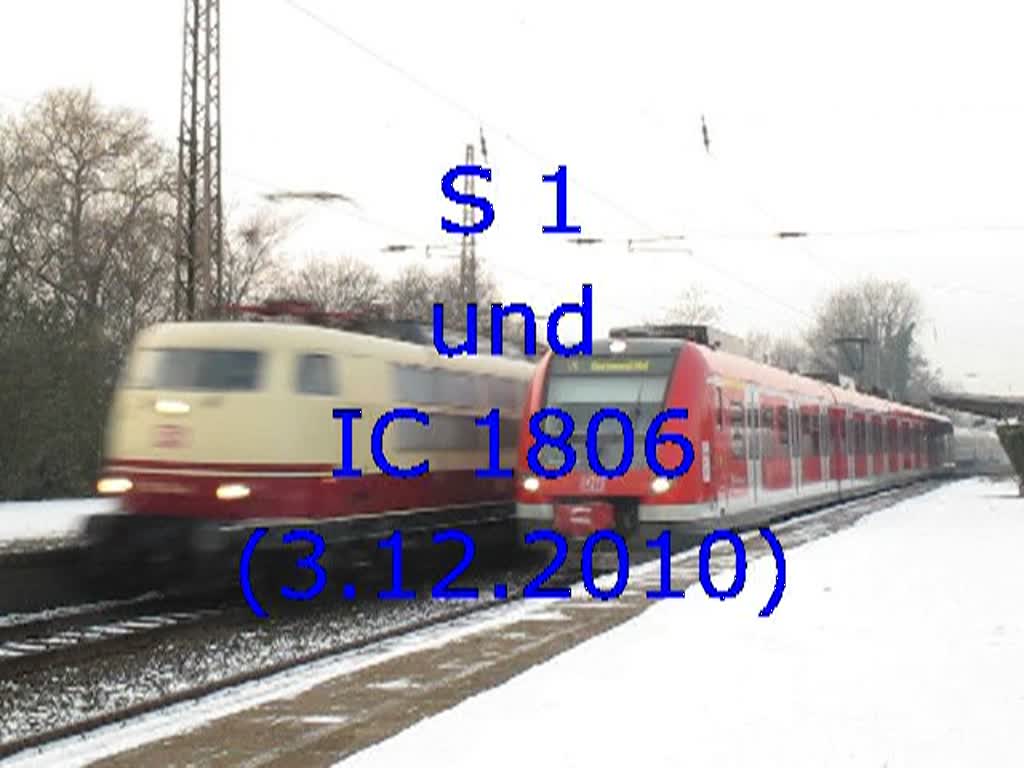 Die als Kurzzug (1 x 422) gefahrene S 1 verdeckt am 3. Dezember 2010 den durch Mlheim-Styrum fahrenden IC 1806 mit Zuglok 103 184 fast vollstndig. Schade!