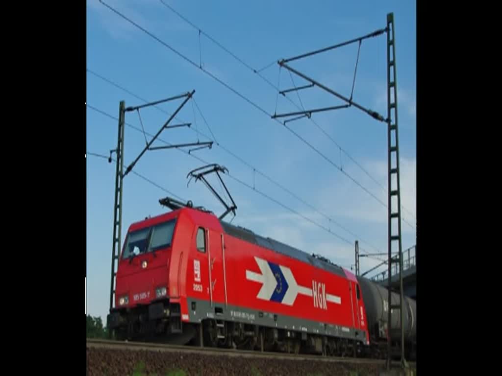 HGK 185 585-7 mit Kesselwagenzug in Fahrtrichtung Norden. Aufgenommen zwischen Eichenberg und Friedland(HAN) am 09.07.2010.