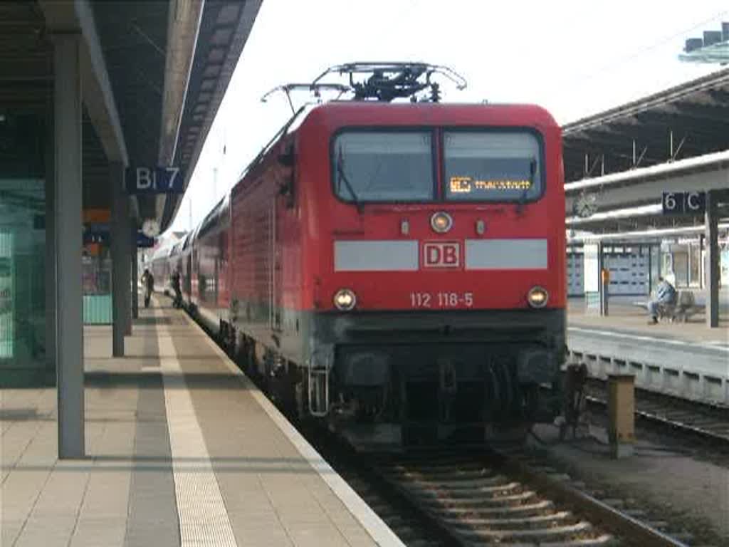 RE33113 von Rostock Hbf.nach Lutherstadt Wittenberg kurz vor der Ausfahrt im Rostocker Hbf.(04.04.09)