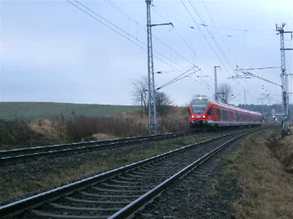 RE33209 von Rostock Hbf.nach Sassnitz kurz nach der Ausfahrt im Rostocker Hbf.(08.02.09)