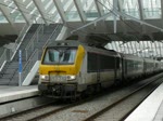 Abfahrt des ICa Eupen - Oostende im Bahnhof von Lttich am 16.01.10 um 12.00 Uhr, gezogen wird der Zug von SNCB Lok 1335.