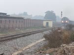 Diesellok DF 8B 5736 mit einem langen, leeren Kohlezug verlsst Shouguang City, China, 04.08.11.