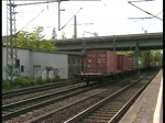 185 501 ehemalig Veolia fuhr mit einem Containerzug durch den Bahnhof Hamburg-Harburg am 22.5