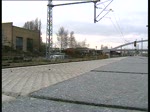 185 512  Rostock Port  fuhr mit einem Container GZ durch den Bahnhof Lbeck am 28.11.