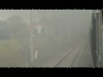 Aus dem Rauch erscheint die (S-bahn Leipzig - Weißenfels)mit 143er gefilmt aus dem Sonderzug mit BR 52 8154-8 25.10.2009 bei Makranstädt