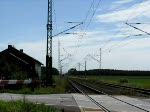 Dampflok BR 91 134 -DR- mit  ihrem  Sonderzug am Bahnbergang vor dem Haltepunkt Rastow/Meckl.