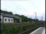 Ausfahrt des Holzrollers aus der Abstellanlage Rotenburg/Wmme am 12.6 Gezogen von einer 142 und geschoben von einer 202.