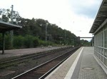 DP 50 der WAB mit Holzzug durch Eichenberg.