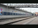 Zwei Regionalexpress-Zge mit 218 kommen jeweils von und in das Illertal im tiefergelegten Bahnhof Neu-Ulm durch, am 1.