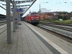 218 397-8+101 027-9 mit IC 2287 von Stralsund nach Hamburg Hbf bei der Ausfahrt im Rostocker Hbf.26.08.2011