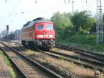 233 232-8 fährt LZ von Rostock Bramow zurück nach WRS bei der Ausfahrt um 07.24 Uhr im Bahnhof Rostock-Bramow.(22.05.09)
