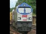 OHE Tiger 330091 mit voll beladenem Holzzug fhrt in Richtung Sden durch Radbruch. Aufgenommen am 06.07.2010.