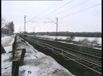 Ein Intercity gefhrt von einem Intercity Steuerwagen fuhr durhc ein kleines rtchen bei Lneburg und wird gleich den Bahnhof Lneburg erreichen.