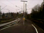 Die orientrote 101 002-4 zieht den DZ 40765 Konstanz - Heidelberg in den Bahnhof Radolfzell.