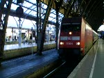 Die orientrote 101 002 verlsst mit dem IC 434 den Klner Hbf von Gleis 7