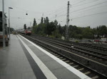 120 148 zieht am 03.08.10 einen IC vorbei am S-Bahnhof Karow Richtung Berlin Hbf.