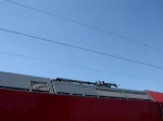Eine Br.146 wechselt im Bahnhof Aalen ihre Stromabnehmer.